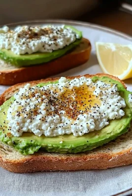 Delicious cottage cheese avocado toast topped with fresh herbs and spices.