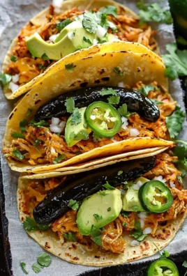 Crispy poblano chicken tacos served with fresh toppings