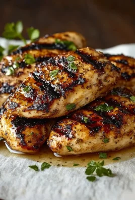 Juicy and flavorful easy grilled chicken served on a plate.