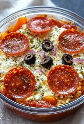 High protein cottage cheese pizza bowl topped with fresh ingredients