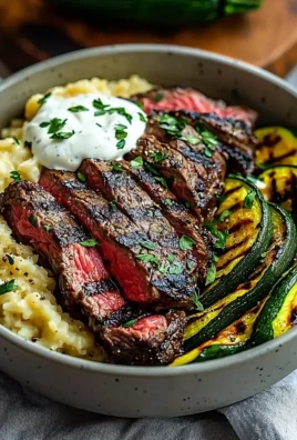 Grilled steak bowl with sauce and grilled zucchini