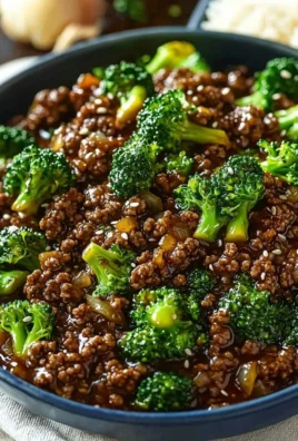 A plate of ground beef and broccoli stir-fry with vibrant vegetables