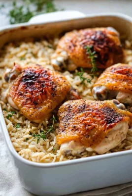 Oven baked chicken served with rice for a delicious weeknight dinner