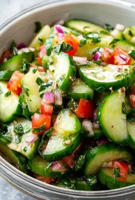 Freshly made Italian cucumber salad with cucumbers and herbs