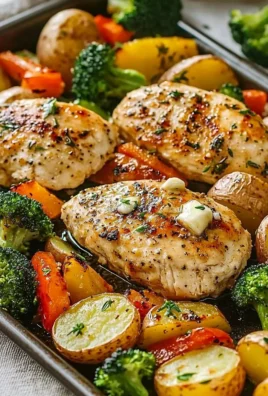Sheet pan garlic butter chicken with assorted veggies cooked to perfection