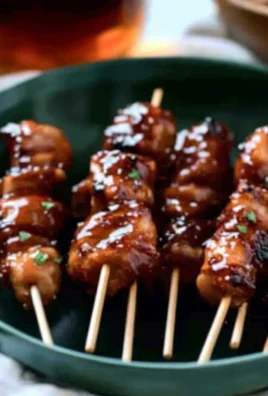 Delicious sticky Bourbon Chicken skewers ready to be served