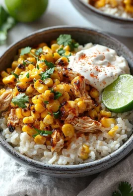Delicious street corn chicken rice bowls topped with fresh ingredients.