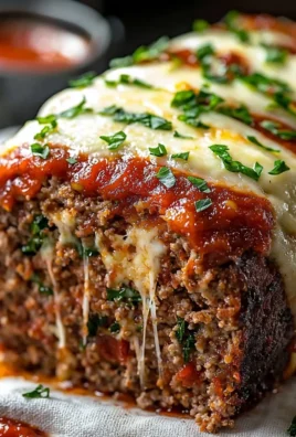 Delicious stuffed Italian meatloaf with herbs and cheese