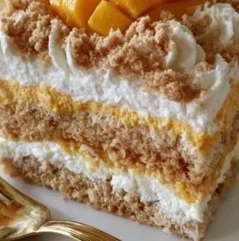 Delicious no-bake mango float dessert with layers of cream and mango slices.