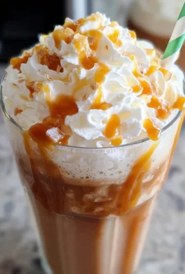 Delicious Caramel Frappuccino topped with whipped cream and caramel drizzle