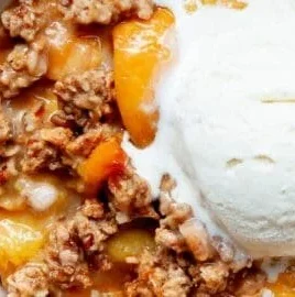 Healthy peach crisp with fresh peaches and an oat topping