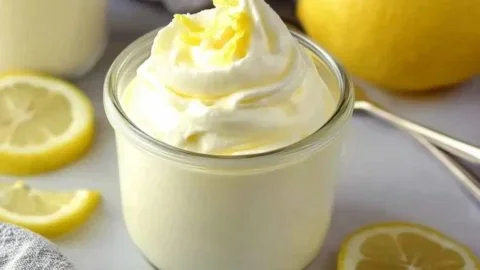 Delicious bowl of indulgent lemon mousse topped with lemon zest