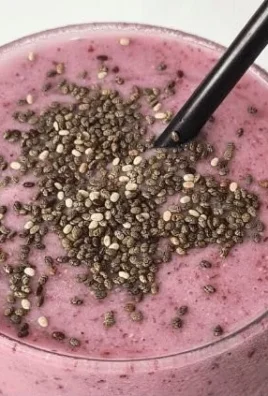 Keto high fiber low carb smoothie in a glass with fresh ingredients
