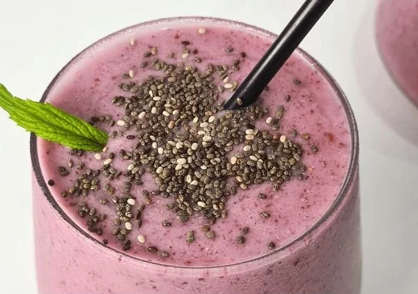 Keto high fiber low carb smoothie in a glass with fresh ingredients