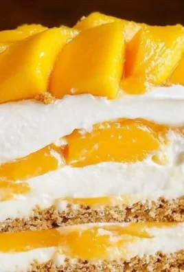 Delicious homemade Mango Float dessert with layers of mango and cream