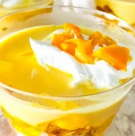 Delicious mango trifle cups layered with cream and fresh mango