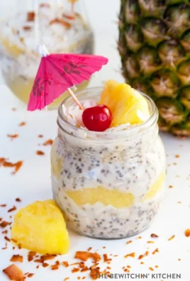 Pina Colada Overnight Oats served in a bowl with fresh coconut and pineapple.