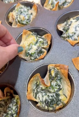 Delicious spinach and artichoke wonton cups on a serving platter