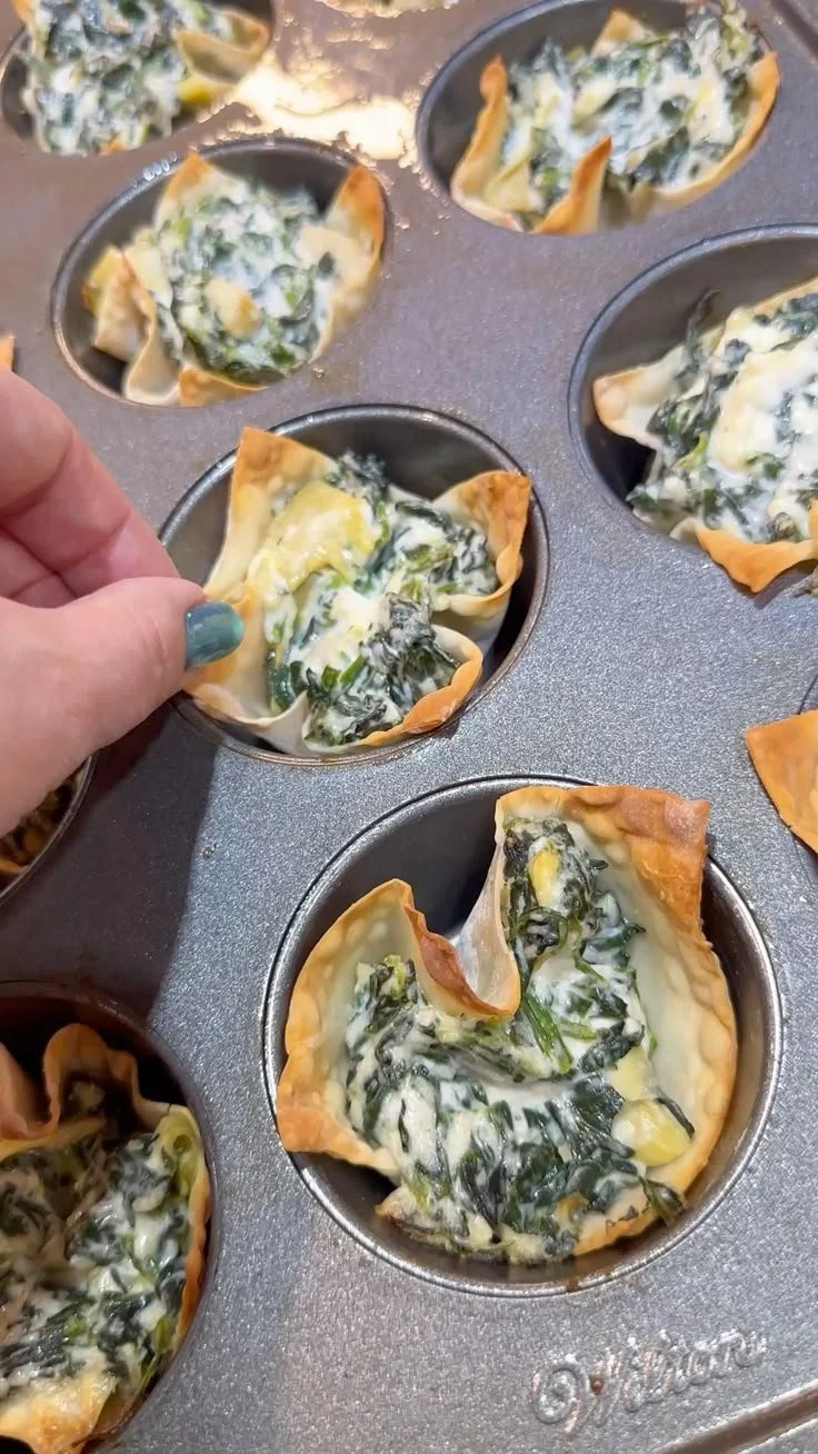 Delicious spinach and artichoke wonton cups on a serving platter