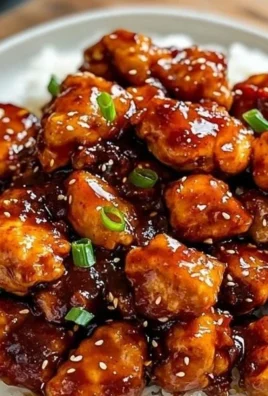 Sticky Sweet Chili Chicken with vibrant colors and glaze on a plate