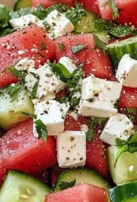 Refreshing Watermelon Cucumber Salad with Feta served in a bowl