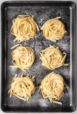 Bowl of authentic homemade vegan pasta topped with fresh herbs