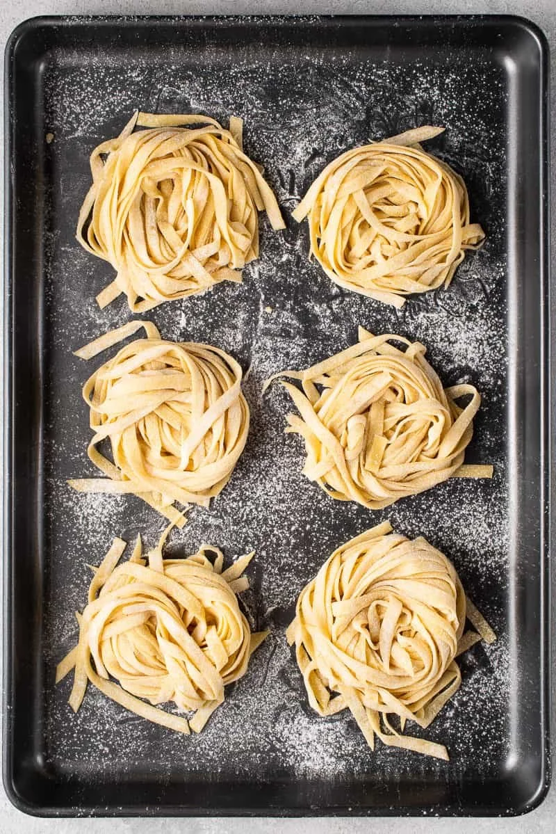 Bowl of authentic homemade vegan pasta topped with fresh herbs