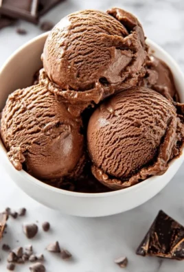Delicious chocolate cottage cheese ice cream in a bowl topped with chocolate chips