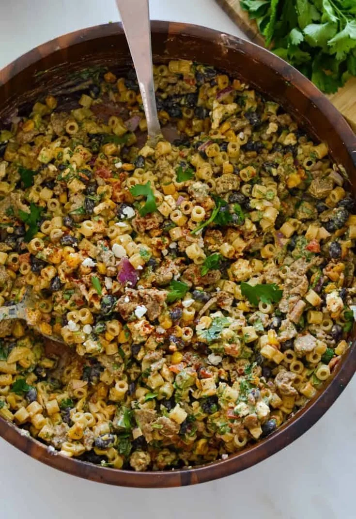 Delicious Corn on the Cob Pasta Salad with fresh vegetables and dressing