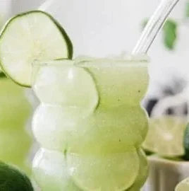 Refreshing Crazy Limeade Slush with vibrant lime color and ice