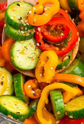 Refreshing cucumber and sweet pepper salad in a colorful bowl