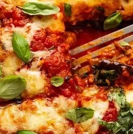 Delicious Eggplant Parmigiana with layers of cheese and tomato sauce