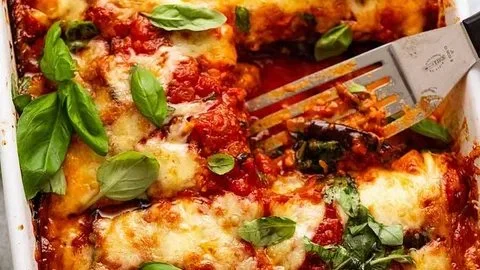 Baked Eggplant Parmigiana with layers of cheese and marinara sauce