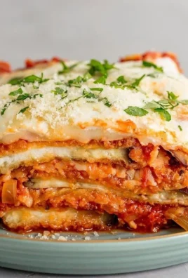 Delicious homemade eggplant parm with melted cheese and rich tomato sauce