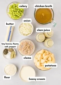 Bowl of rich New England clam chowder topped with parsley and oyster crackers