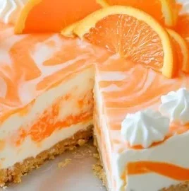Delicious no-bake orange creamsicle cheesecake topped with orange slices