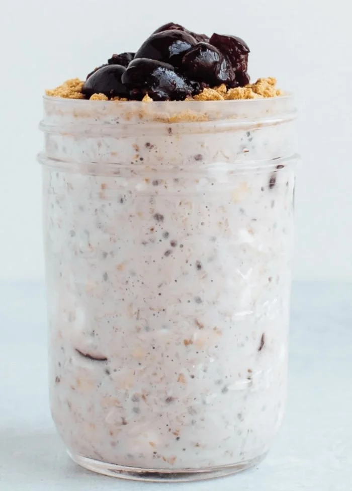 Delicious overnight oats served in a bowl with fresh fruits and nuts.