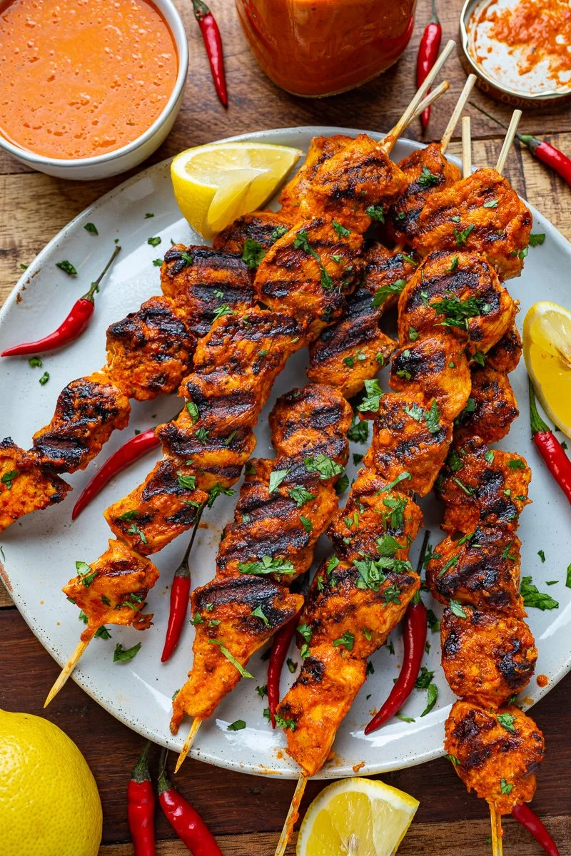 Delicious peri peri chicken skewers grilled to perfection with spices.