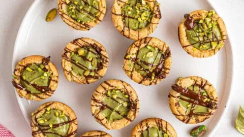 Delicious Pistachio Cream Cookie Cups topped with creamy filling and pistachio nuts