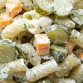Creamy dill pickle pasta salad in a bowl, perfect for summer gatherings.