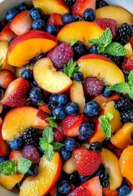 Delicious summer peach fruit salad with fresh peaches and mixed fruits