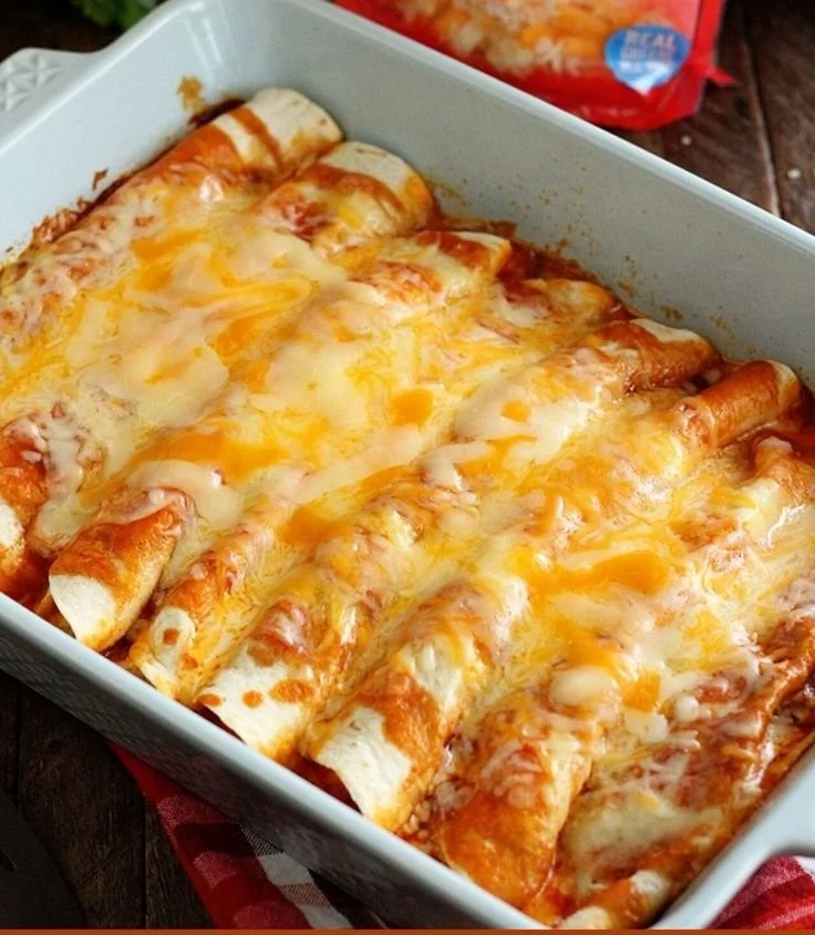 5 Ingredient Beef Enchiladas ready to serve with toppings.