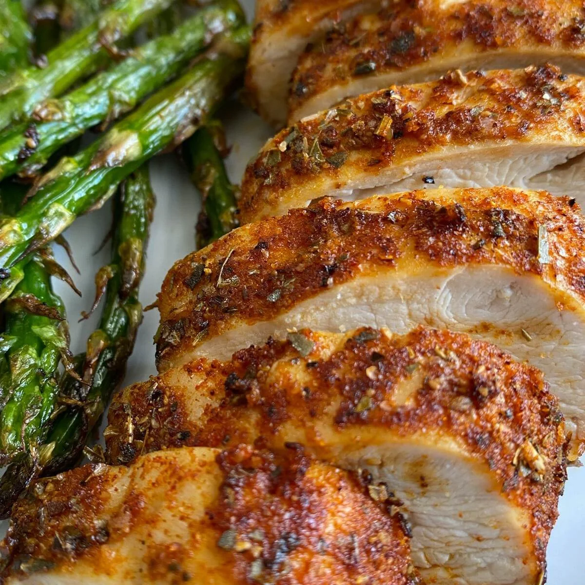 Crispy air fryer boneless skinless chicken breast on a plate