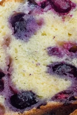 Delicious homemade Blueberry Cream Cheese Loaf with blueberries and cream cheese