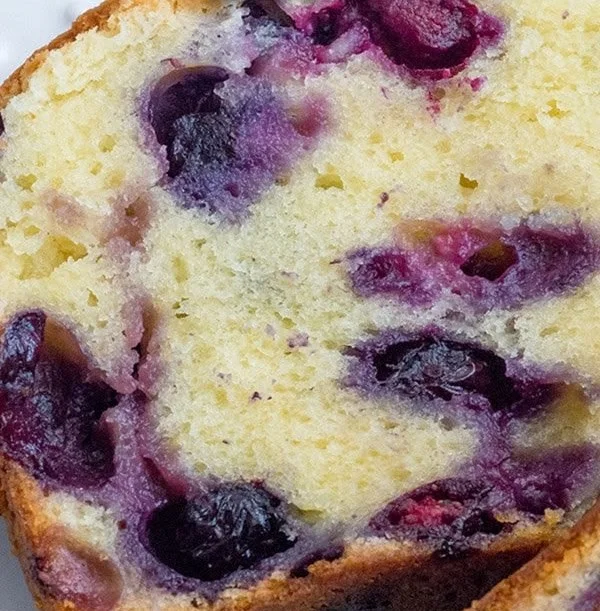 Delicious homemade Blueberry Cream Cheese Loaf with blueberries and cream cheese