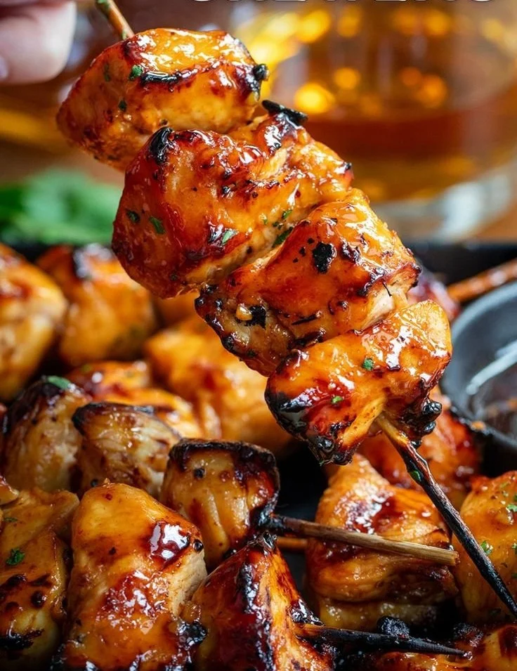 Delicious Bourbon Chicken Skewers served on a platter.
