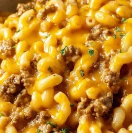 Delicious Cheesy Hamburger Helper in a bowl with melted cheese