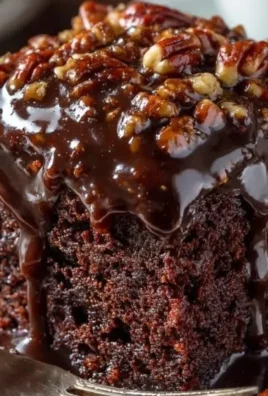 Delicious Coca-Cola Cake topped with frosting and chocolate decorations