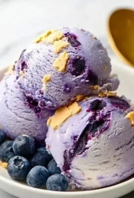 Creamiest Ninja Creami blueberry cheesecake protein ice cream in a bowl
