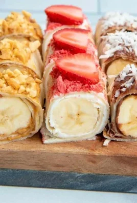 Easy banana sushi rolls with chocolate and nuts on a plate